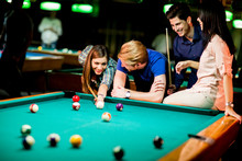 Young People Playing Billiard