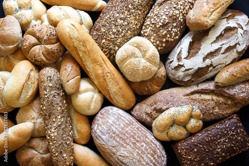 Fotografie, Obraz Many mixed breads and rolls shot from above.