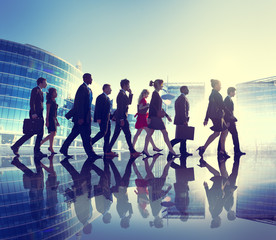Wall Mural - Group of Business People Walking Back Lit Concept