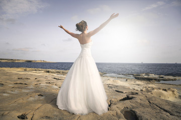 Happy bride at the seaside