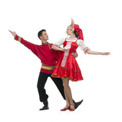 Wall Mural - dancers in russian traditional costumes, embracing