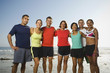 © Erik Isakson/Blend Images - Multi-ethnic runners at beach