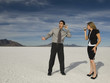 © Erik Isakson/Blend Images - Hispanic businesspeople talking on can and string telephone