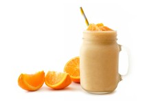 Orange Smoothie In A Jar With Straw And Fruit Slices Isolated