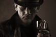© pepscostudio - Old gangster and a glass of wine