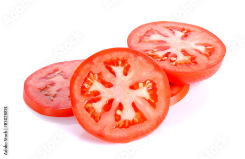 Fotografía Slice tomato isolated on the white background