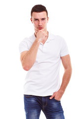 Wall Mural - Pensive man in a white polo shirt