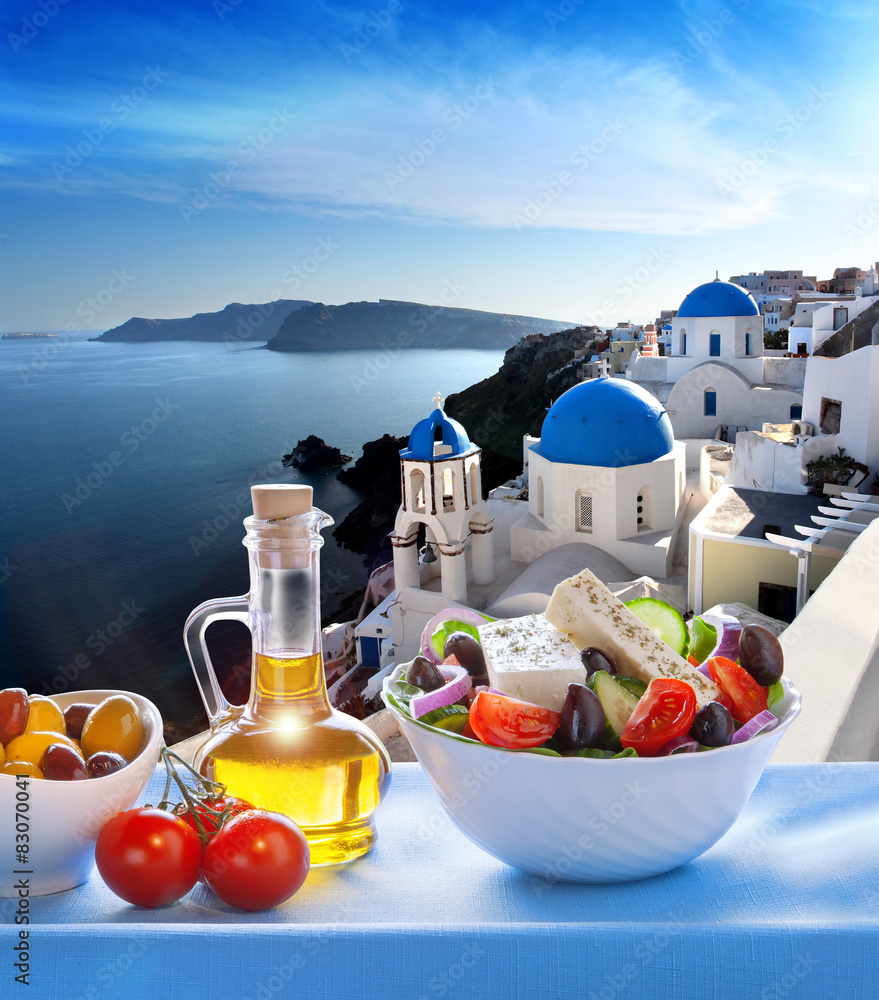 Greek salad  in Oia village, Santorini island in Greece - obrazy, fototapety, plakaty 