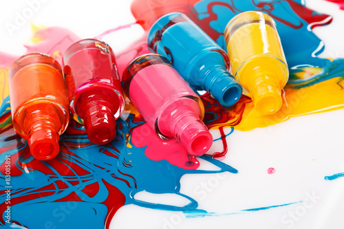 Valokuvatapetti Bottles with spilled nail polish