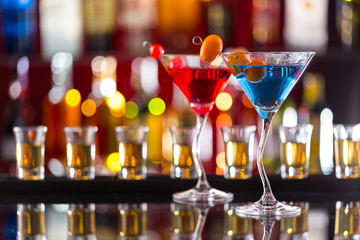 Wall Mural - Martini drinks served on bar counter