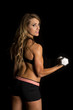 © Poulsons Photography - fit woman in black shorts and top curl weight on black back