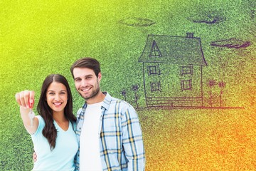 Poster - Composite image of happy young couple showing new house key