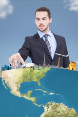Poster - Composite image of cheerful businessman pointing at camera 