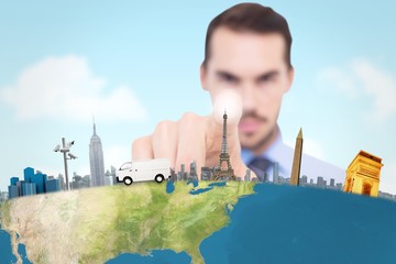 Poster - Composite image of businessman pointing his finger at camera