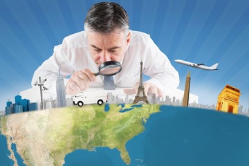 Poster - mature businessman examining with magnifying glass
