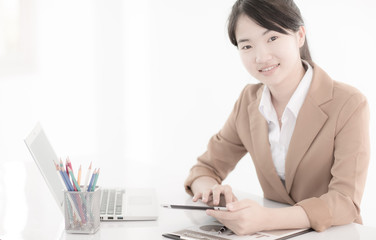 young asian businesswoman working in office