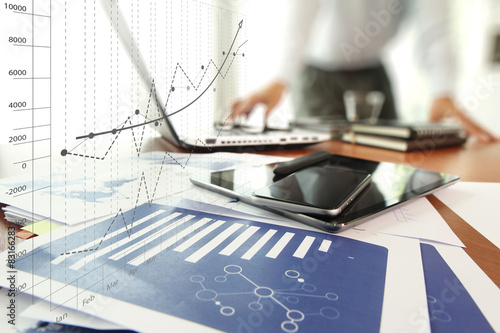 Cuadros en Lienzo business documents on office table with smart phone and digital