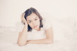 © Nonwarit - Portrait of a beautiful young woman in bed