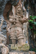 Evil man sculpture Am Phu Cave Danang