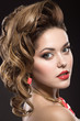 © Kobrinphoto - Beautiful girl with evening hairstyle and bright makeup