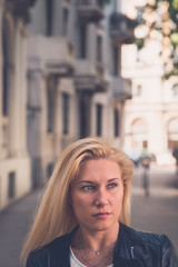 Beautiful girl posing in the city streets