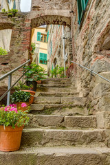 Fototapete - Alley in Italian old town Liguria Italy