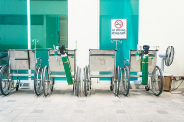 wheelchair and oxygen tank in the hospital