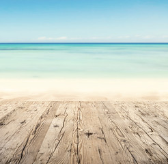 Wall Mural - Empty wooden pier with view on sandy beach