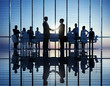 © Rawpixel.com - Two Businessmen Having Together with theri Colleagues