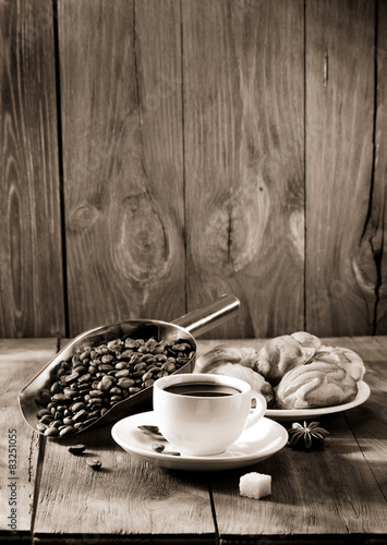 Fototapeta na wymiar cup of coffee on wood