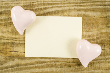 Poster - Empty card with hearts on wooden table