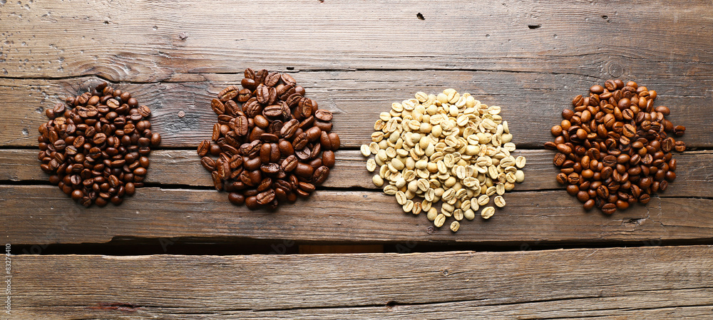 Coffee beans on wooden background