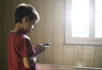 child playing with phone