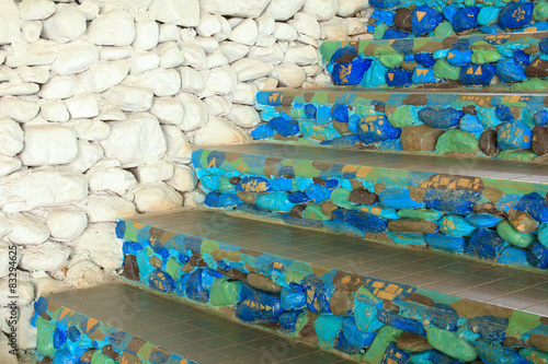 Fototapeta na wymiar blue stone stairs and white wall