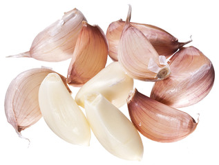 Wall Mural - Lots garlic clove isolated on a white background.