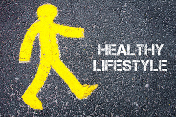 Pedestrian figure walking towards HEALTHY LIFESTYLE