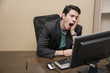 © theartofphoto - Tired bored young businessman sitting in office yawning