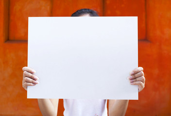 Wall Mural - Girl holding white board