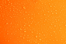 Water Drops On Orange Background