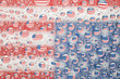 American flag reflected in water drops background