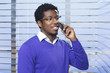 © rilueda - Young african man on phone
