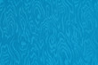 Blue cyan silk damask fabric with moire pattern