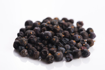 Wall Mural - Juniper berries on white background