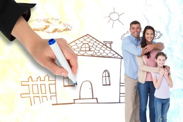 Wall Mural - Composite image of happy family embracing each other over