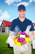 © WavebreakMediaMicro - Composite image of happy delivery man holding bouquet