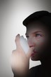 © WavebreakmediaMicro - Composite image of blonde woman taking her inhaler