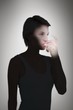 © WavebreakmediaMicro - Composite image of blonde woman taking her inhaler