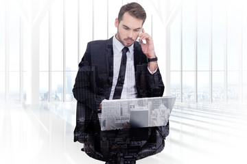 Poster - Composite image of businessman using laptop while phoning