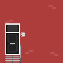 Red Wall With Black Door, Porch And Doorbell. 