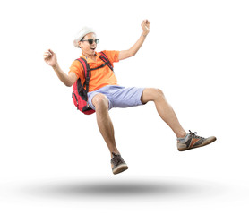 portrait of young asian traveler man floating mid air with crazy